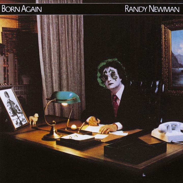 Album cover with man sitting at desk